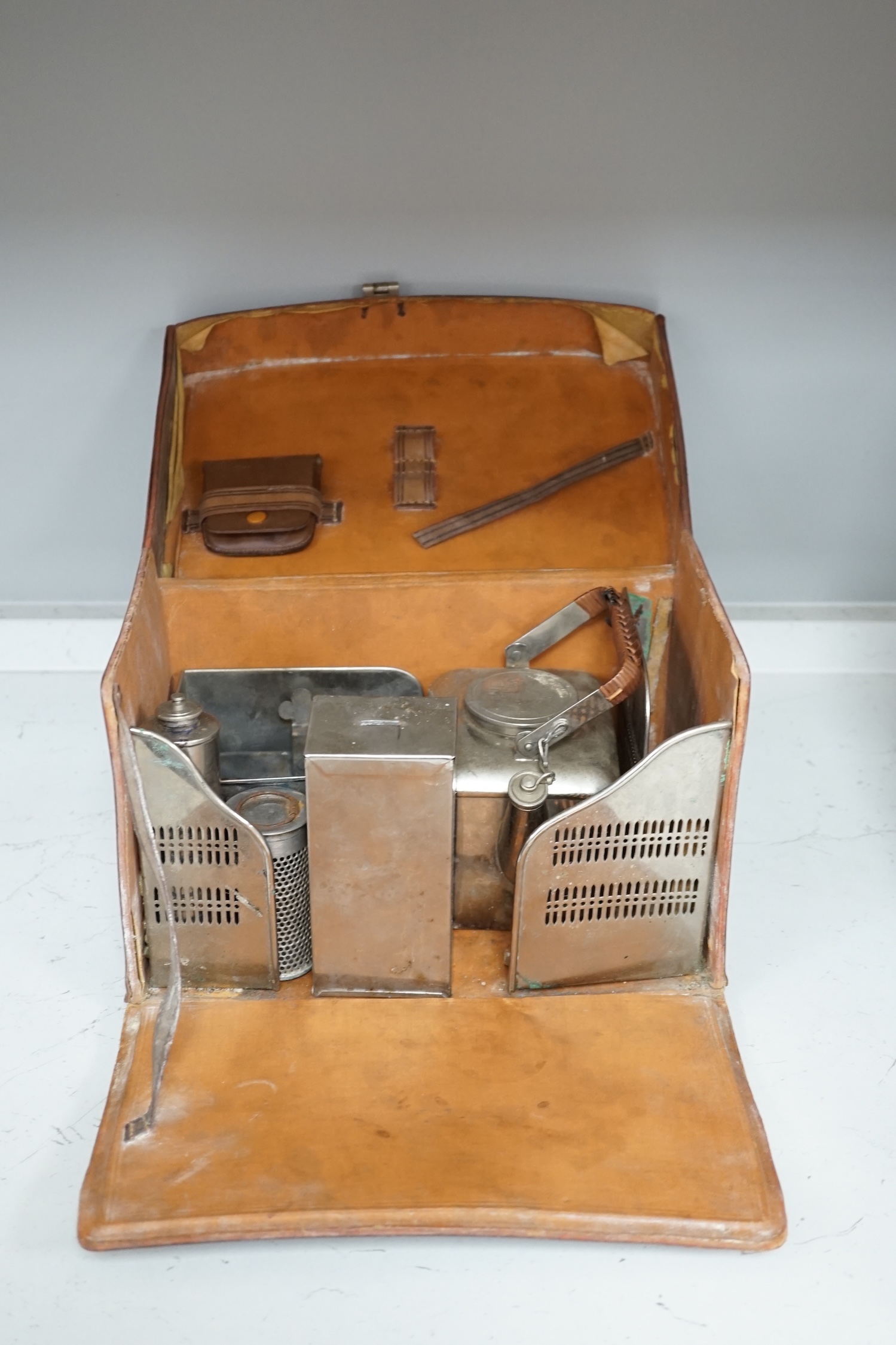 Two Savoy Hotel silver plated items comprising ice bucket and basket with swing handle together with a leather cased travelling picnic tea set. Condition - fair